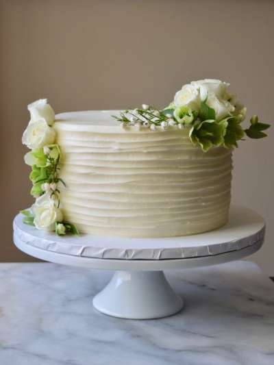Cake, White Icing, Green and White decorations