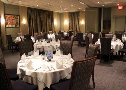 Arlington & Chestnut rooms combined with round tables to seat 80