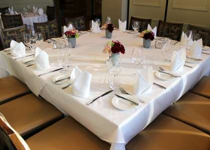 The semi-private Newbury Room can be set up with one large square table, seating 12