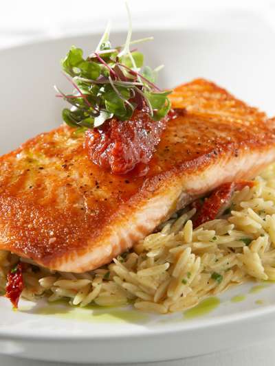 Seared Salmon, Cauliflower, Golden Raisins, Peppadews, Toasted Pine Nuts