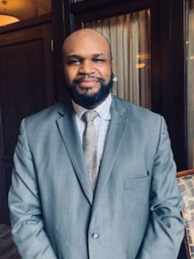 Man with beard in a suit