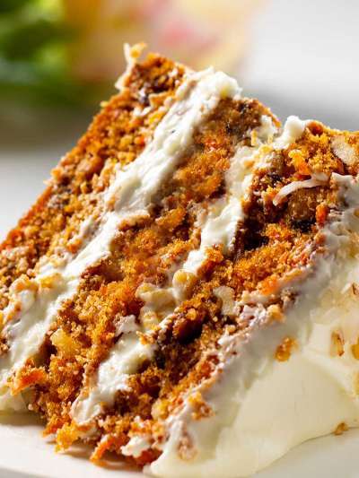 Piece of Carrot Cake on a white plate