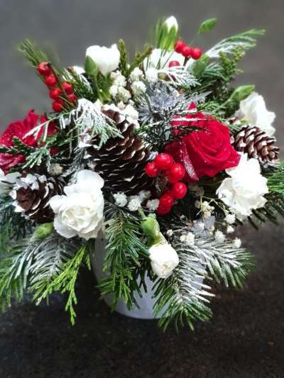 Holiday Flower Centerpiece, White Pinecones, Red Flowers, Green Leaves