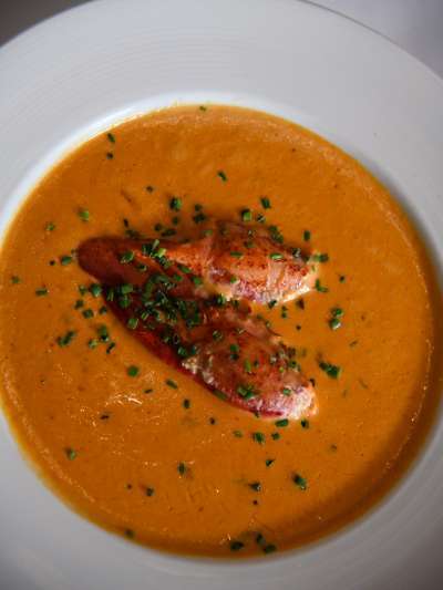 Bowl of Lobster Bisque with Lobster Claw Meat and Chives
