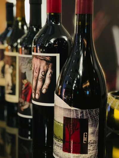 4 Orin Swift Wine bottles in a line