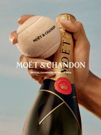 Bottle of Moet & Chandon and a tennis ball