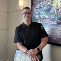 Man Black Chef Jacket leaning on a chair
