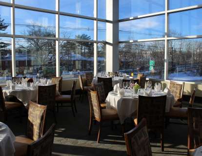 When set with round tables for six, the Boylston Room has a seated capacity of 64
