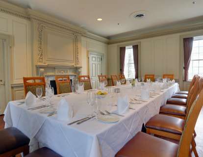 When set with a single large Roman table, the Chairman's Room seats 22