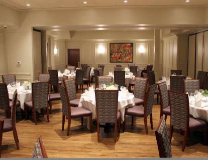 Combined rooms seat up to 125 people or hold 150 for a reception