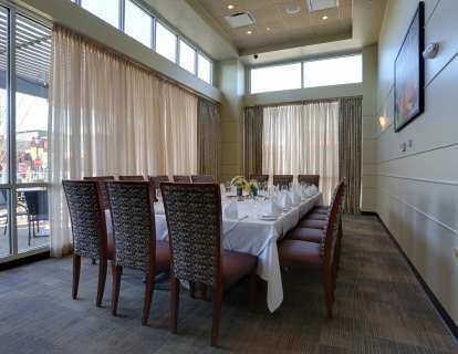 When set with a long, conference style table, the Washington Room seats 18